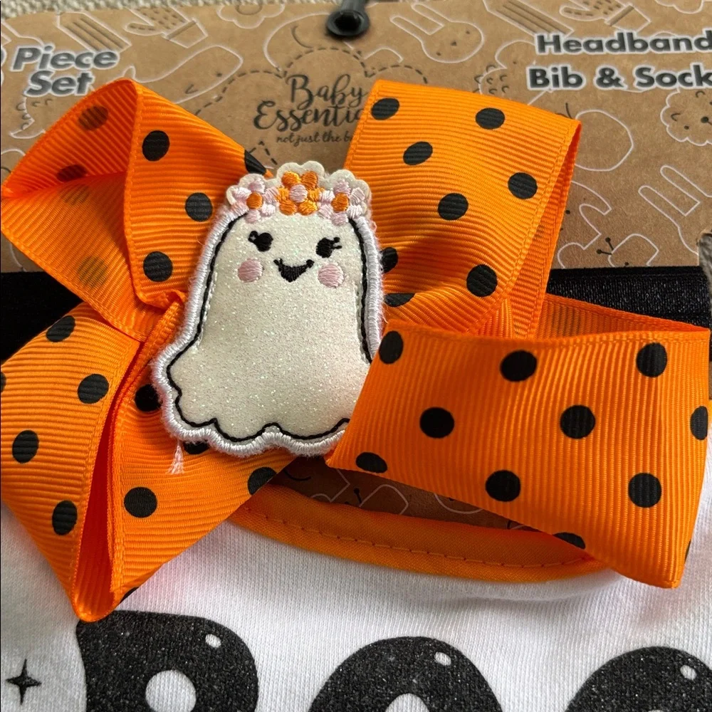 baby Halloween bib, headband, and socks set with a 